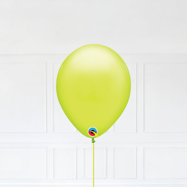 Chartreuse color Latex balloon inflated with helium and a matching with 1.5 meter ribbon