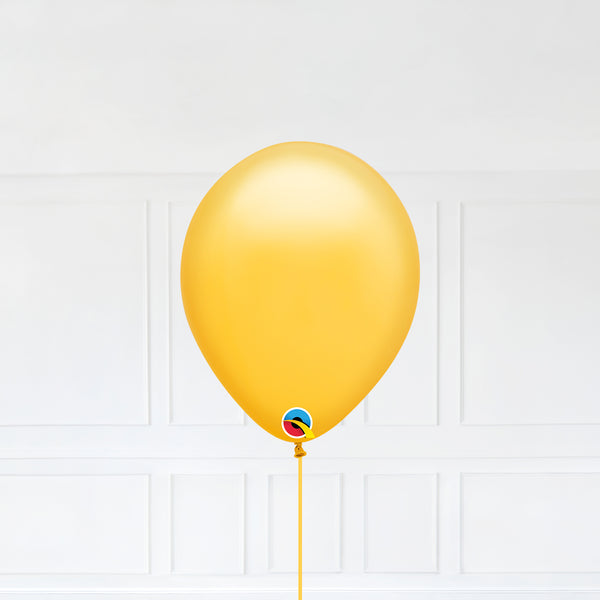 Goldenrod color Latex balloon inflated with helium and a matching with 1.5 meter ribbon