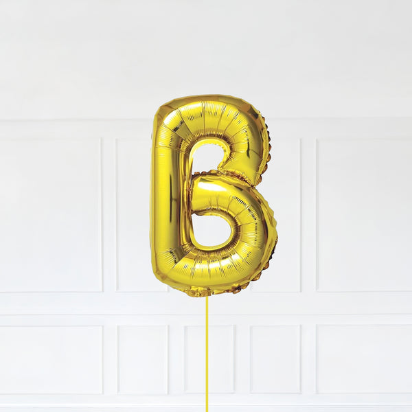 Letter B Foil Balloon Inflated With Helium, Gold Color Letter B with Balloon String and Balloon Weight.