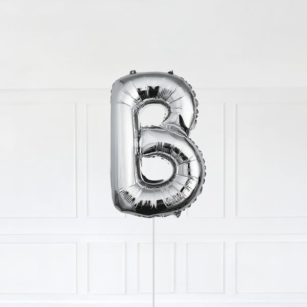 Letter B Foil Balloon Inflated With Helium, Silver Color Letter B with Balloon String and Balloon Weight.