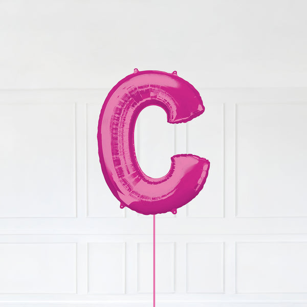 Letter C Foil Balloon Inflated With Helium, Pink Color Letter C with Balloon String and Balloon Weight.