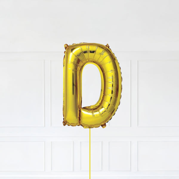 Letter D Foil Balloon Inflated With Helium, Gold Color Letter D with Balloon String and Balloon Weight.