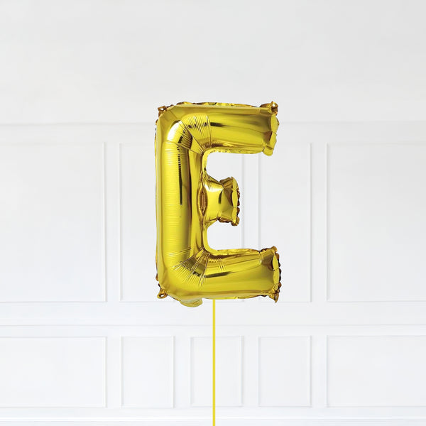 Letter E Foil Balloon Inflated With Helium, Gold Color Letter E with Balloon String and Balloon Weight.