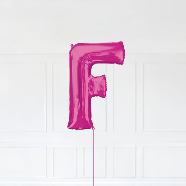 Letter F Foil Balloon Inflated With Helium, Pink Color Letter F with Balloon String and Balloon Weight.