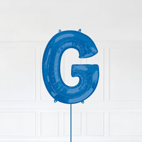 Letter G Foil Balloon Inflated With Helium, Blue Color Letter G with Balloon String and Balloon Weight.