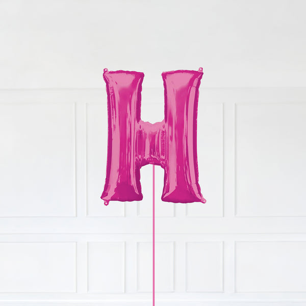 Letter H Foil Balloon Inflated With Helium, Pink Color Letter H with Balloon String and Balloon Weight.