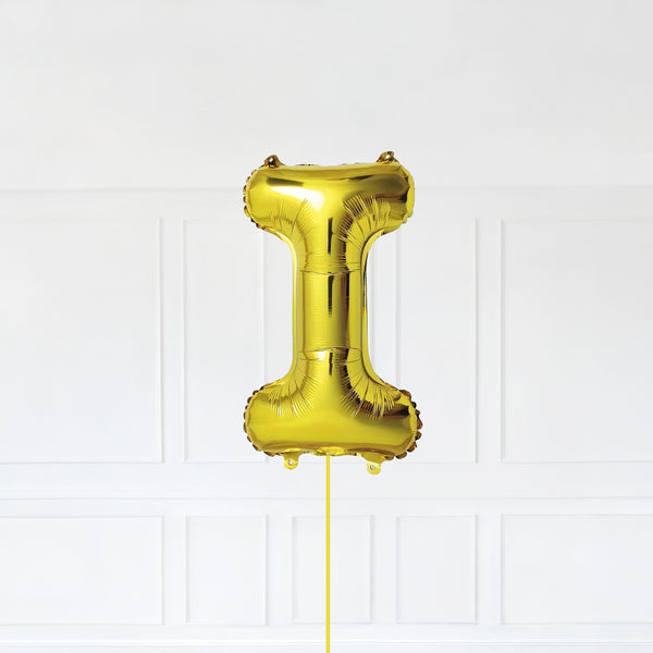 Letter I Foil Balloon Inflated With Helium, Gold Color Letter I with Balloon String and Balloon Weight.