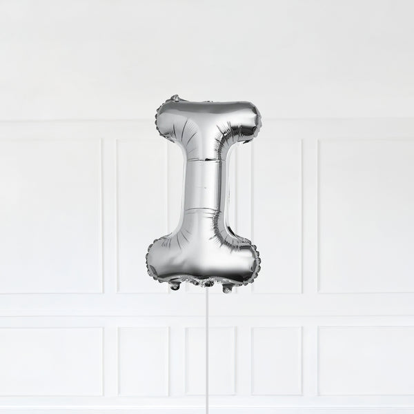 Letter I Foil Balloon Inflated With Helium, Silver Color Letter I with Balloon String and Balloon Weight.