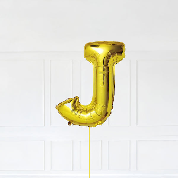 Letter J Foil Balloon Inflated With Helium, Gold Color Letter J with Balloon String and Balloon Weight.