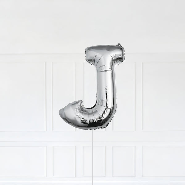 Letter J Foil Balloon Inflated With Helium, Silver Color Letter J with Balloon String and Balloon Weight.