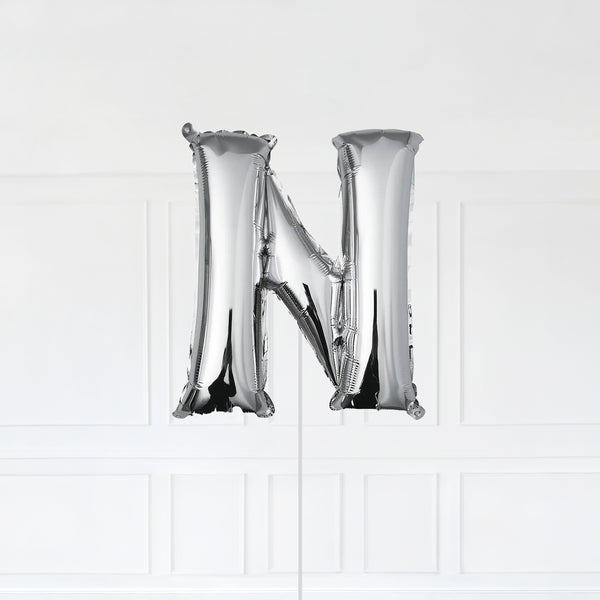 Letter N Foil Balloon Inflated With Helium, Silver Color Letter N with Balloon String and Balloon Weight.