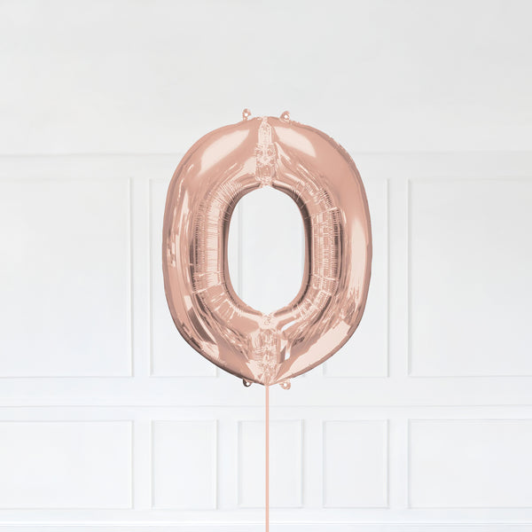 Letter O Foil Balloon Inflated With Helium, Rose Gold Color Letter O with Balloon String and Balloon Weight.