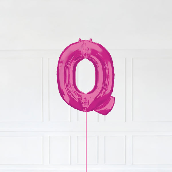 Letter Q Foil Balloon Inflated With Helium, Pink Color Letter Q with Balloon String and Balloon Weight.