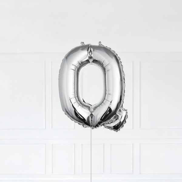 Letter Q Foil Balloon Inflated With Helium, Silver Color Letter Q with Balloon String and Balloon Weight.