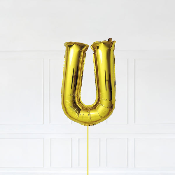 Letter U Foil Balloon Inflated With Helium, Gold Color Letter U with Balloon String and Balloon Weight.