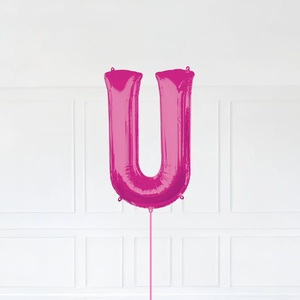 Letter U Foil Balloon Inflated With Helium, Pink Color Letter U with Balloon String and Balloon Weight.