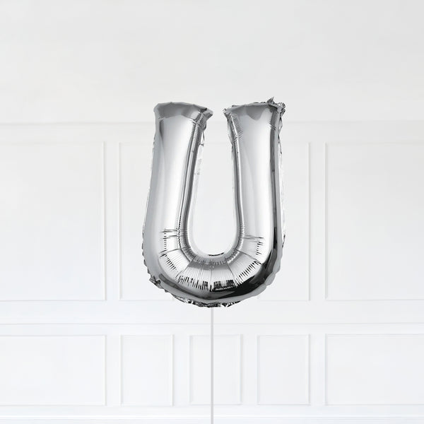 Letter U Foil Balloon Inflated With Helium, Silver Color Letter U with Balloon String and Balloon Weight.