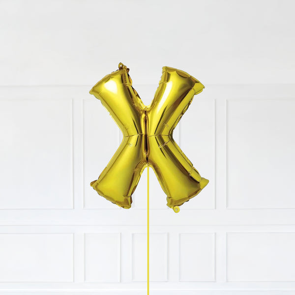 Letter X Foil Balloon Inflated With Helium, Gold Color Letter X with Balloon String and Balloon Weight.