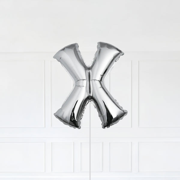 Letter X Foil Balloon Inflated With Helium, Silver Color Letter X with Balloon String and Balloon Weight.