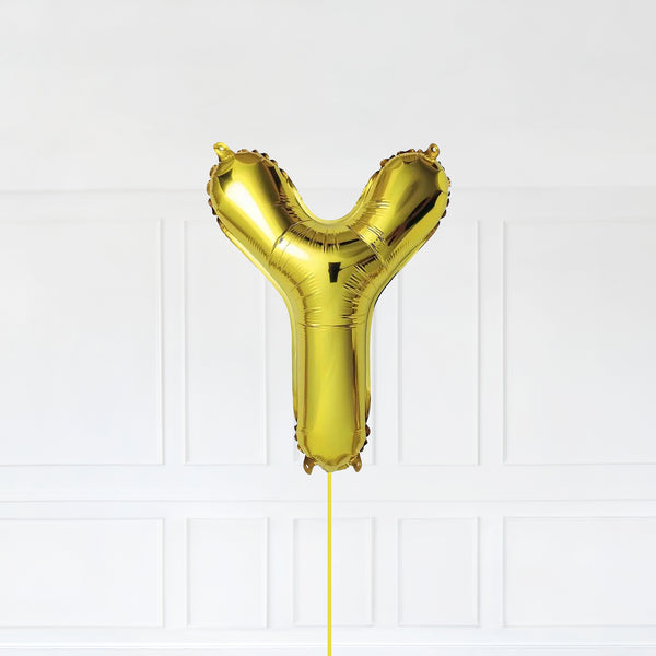 Letter Y Foil Balloon Inflated With Helium, Gold Color Letter Y with Balloon String and Balloon Weight.