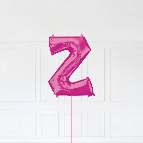 Letter Z Foil Balloon Inflated With Helium, Pink Color Letter Z with Balloon String and Balloon Weight.