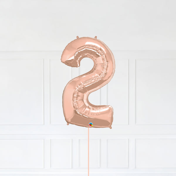 Number 2 Foil Balloon Inflated With Helium, Rose Gold Color Number Two with Balloon String and Balloon Weight.