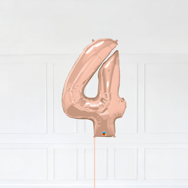 Number 4 Foil Balloon Inflated With Helium, Rose Gold Color Number Four with Balloon String and Balloon Weight.