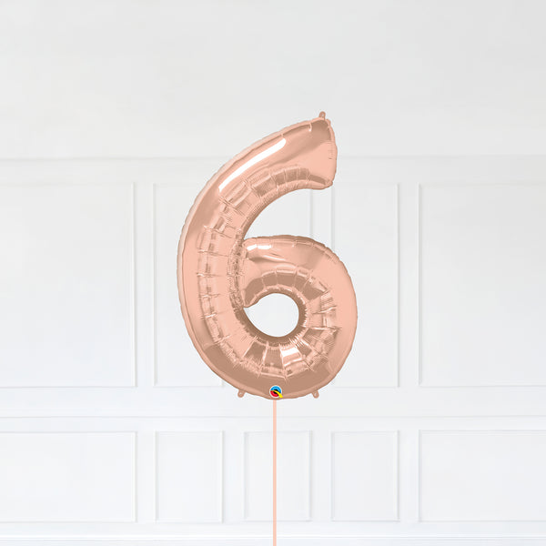 Number 6 Foil Balloon Inflated With Helium, Rose Gold Color Number Six with Balloon String and Balloon Weight.