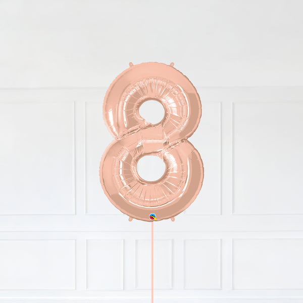 Number 8 Foil Balloon Inflated With Helium, Rose Gold Color Number Eight with Balloon String and Balloon Weight.