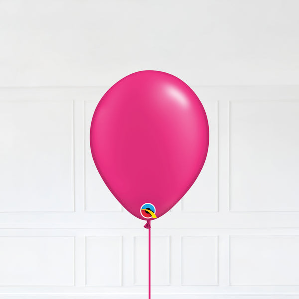 Radiant Pearl Magenta color Latex balloon inflated with helium and a matching with 1.5 meter ribbon