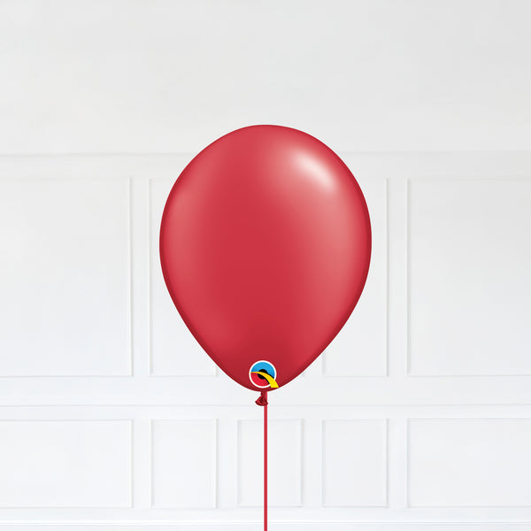 Radiant Pearl Ruby Red color Latex balloon inflated with helium and a matching with 1.5 meter ribbon