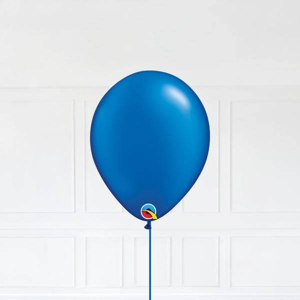 Radiant Pearl Sapphire Blue color Latex balloon inflated with helium and a matching with 1.5 meter ribbon