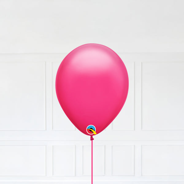 Wild Berry color Latex balloon inflated with helium and a matching with 1.5 meter ribbon